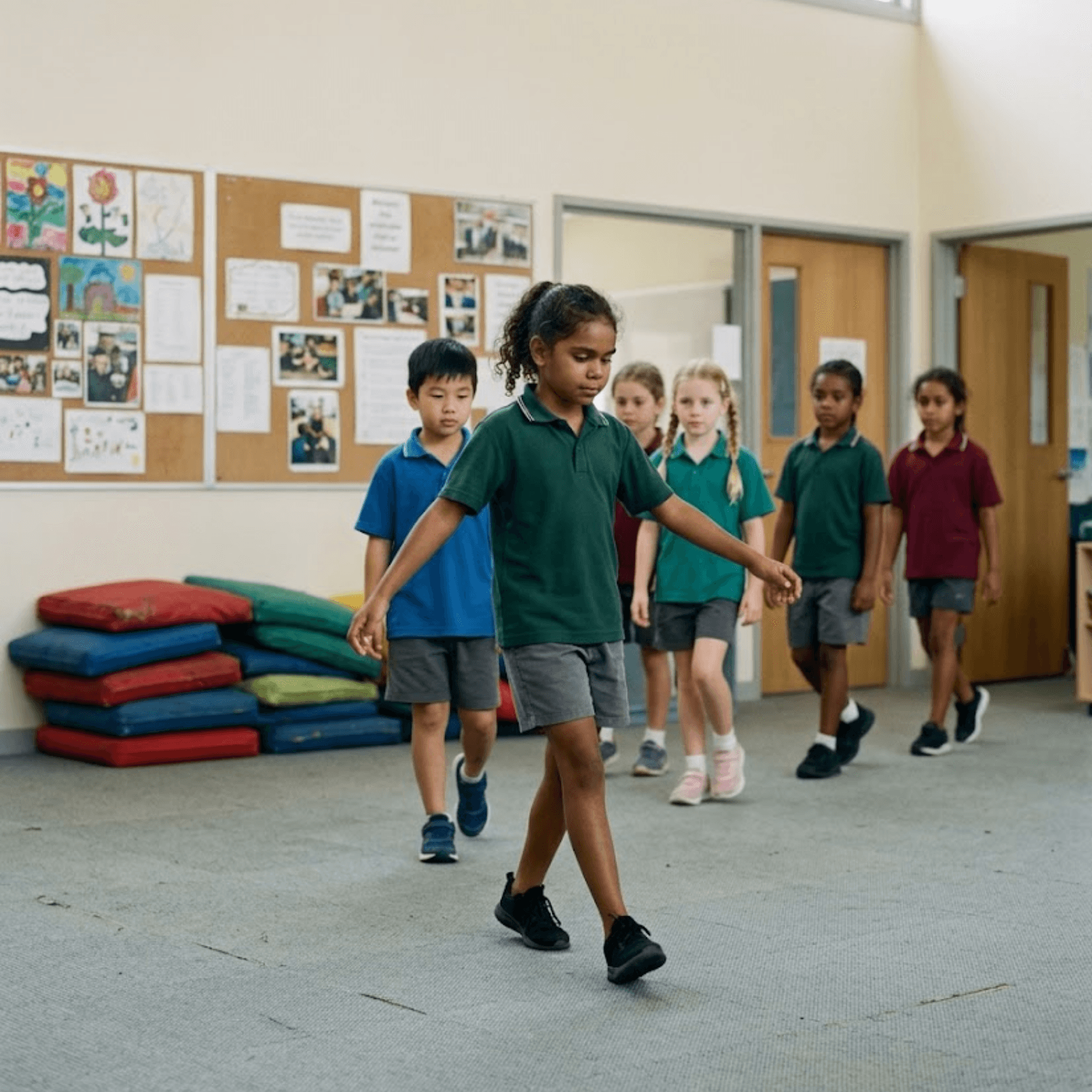 Children moving through a simple classroom movement pathway